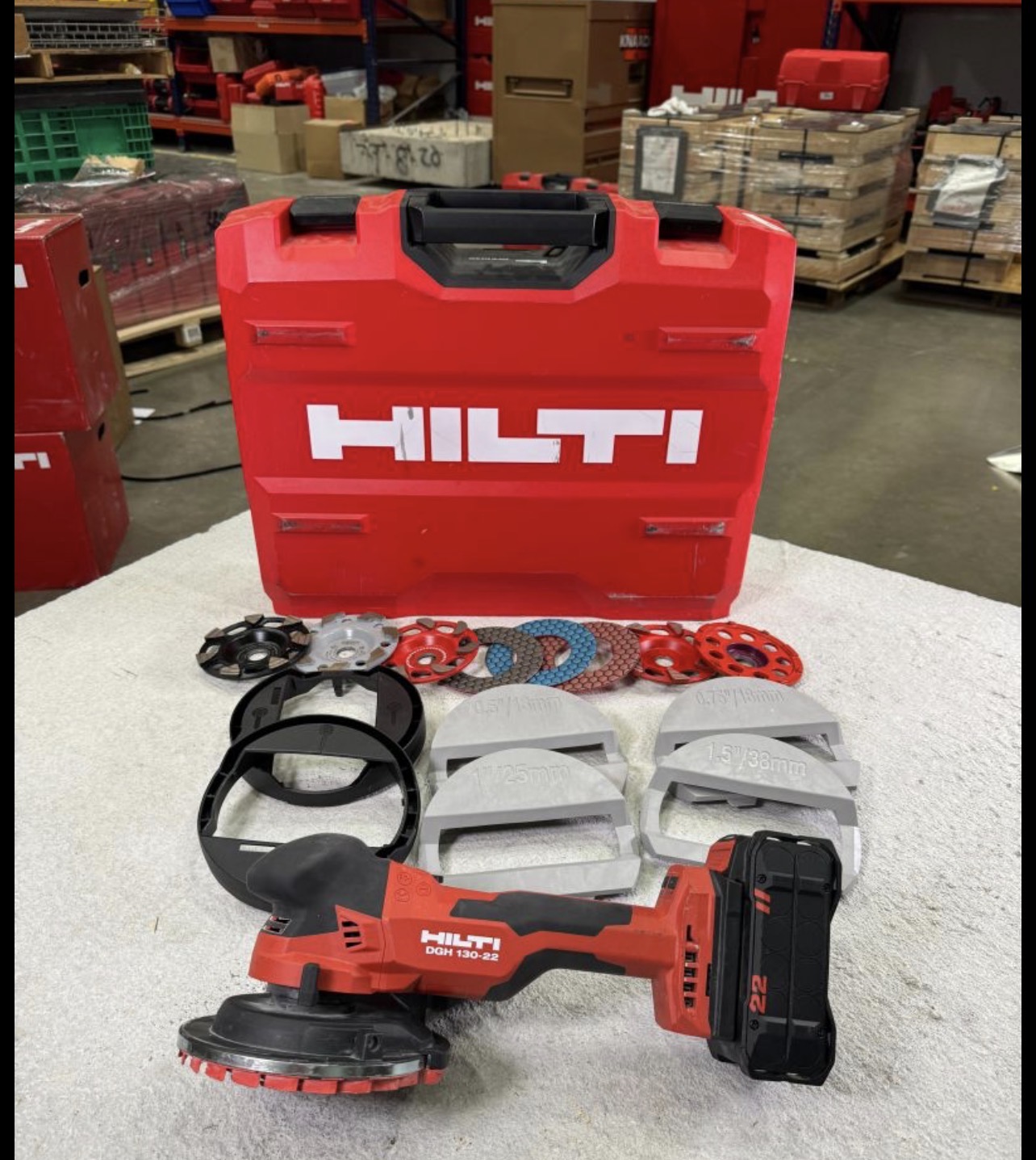 Hilti DGH 130-22 cordless diamond grinder with flatness correction pads — floor flatness correction for large format tile installation in Ottawa